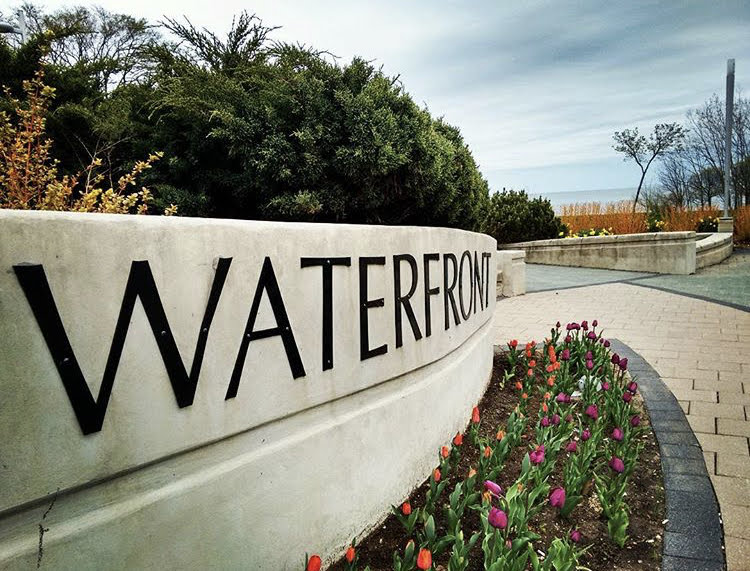 Burlington waterfront sign with flowers