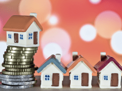 Row of houses with money